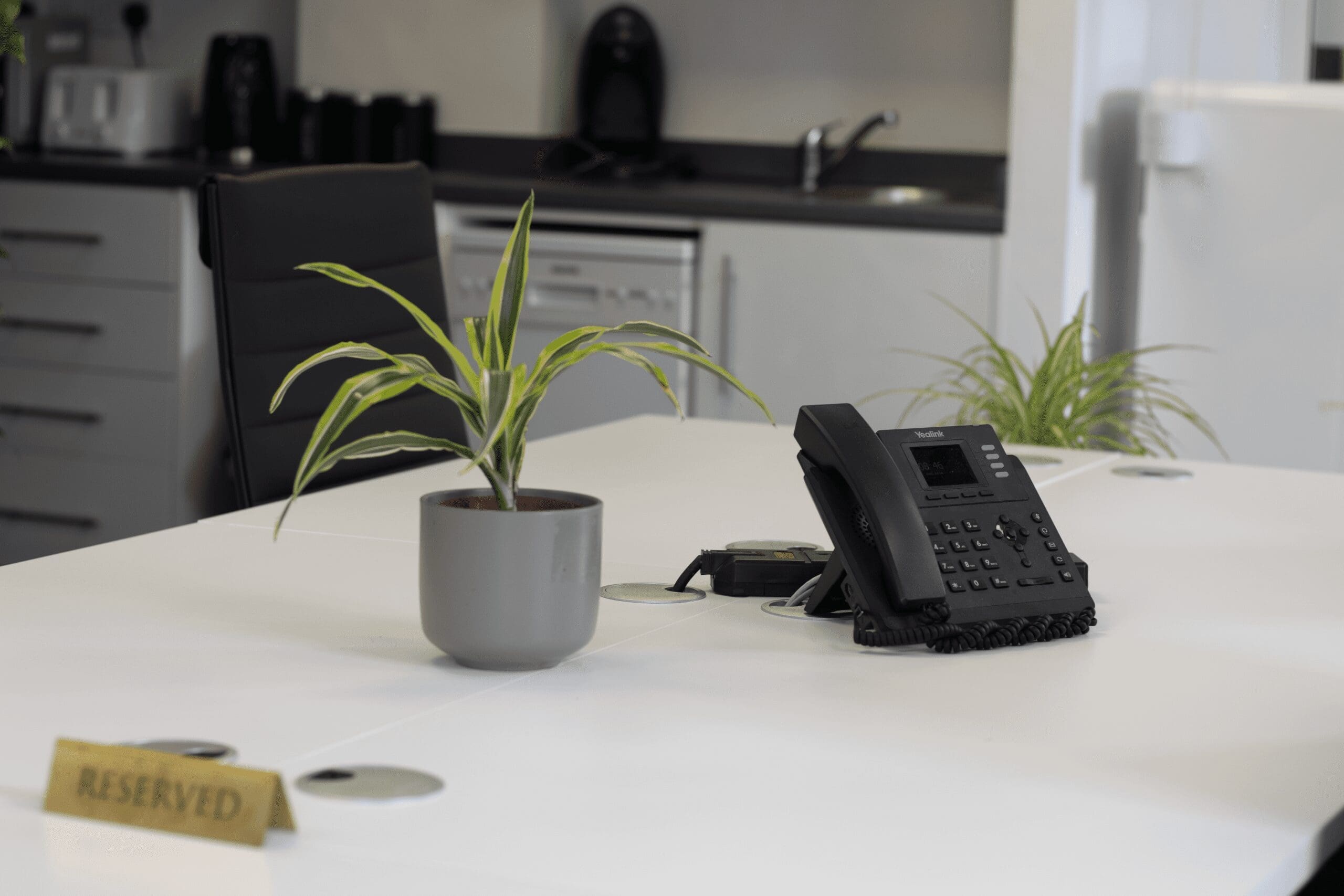 Modern office with reserved seating.